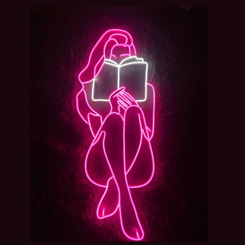 Woman Reading Neon Signs